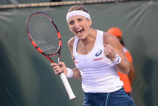 March 26, 2016 - Miami, Florida, United States - TIMEA BACSINSZKY of Switzerland celebrates match point in her match vs. a. Ivanovic at the Miami Open Tennis 2016 - Miami Open - Day 6 - ZUMAl132