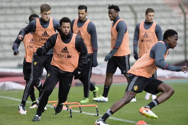 Belgium s Nicolas Lombaerts, Belgium s Moussa Dembele and Belgium s Dedryck Boyata pictured during a training session of the Belgian national soccer team Red Devils, Sunday 27 March 2016 in Brussels. The Red Devils will play a friendly game in and against Portugal on 29 March, the match was moved due to safety concerns after the Brussels terrorists attacks. The game is a preparation for the upcoming Euro2016. NICOxVEREECKEN  x04821830x