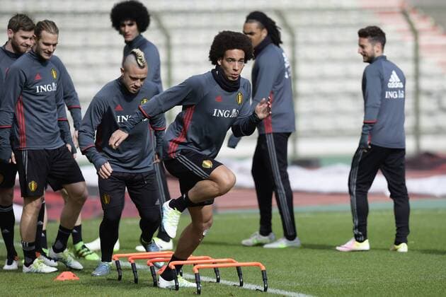 Belgium s Radja Nainggolan and Belgium s Axel Witsel a training session of the Belgian national soccer team Red Devils, Sunday 27 March 2016 in Brussels. The Red Devils will play a friendly game in and against Portugal on 29 March, the match was moved due to safety concerns after the Brussels terrorists attacks. The game is a preparation for the upcoming Euro2016. NICOxVEREECKEN  x04821805x