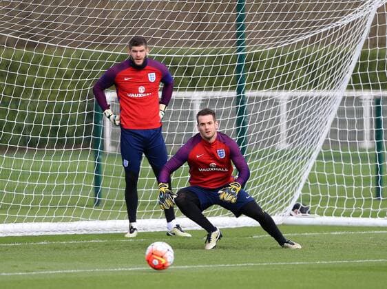 England s Fraser Forster and Tom Heaton in action during training at the Tottenham Hotspur Training Centre. Photo credit should read: David Klein Sportimage EDITORIAL USE ONLY. No use with unauthorised audio, video, data, fixture lists, club league logos or live services. Online in-match use limited to 120 images, no video emulation. No use in betting, games or single club league player publications.
