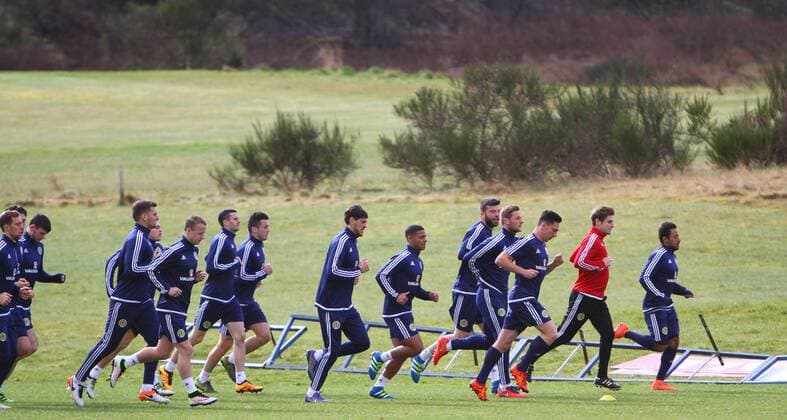 FuÃŸball, Training Nationalteam Schottland 28.03.2016. Mar Hall, Glasgow, Scotland. International Football Scotland Training and Media Event ahead of their game versus Denmark on 29th March. Captain Scott Brown and Ikechi Anya lead the players round the pitch xGeorgariouxVagelisx  ActionPlus11723023