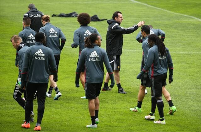 Belgium s head coach Marc Wilmots (C) talks to his players during a training session of the Belgian national soccer team Red Devils in Leiria, Portugal, Monday 28 March 2016. The Red Devils will play a friendly game in and against Portugal on 29 March, the match was moved due to safety concerns after the Brussels terrorists attacks. The game is a preparation for the upcoming Euro2016. VIRGINIExLEFOUR  x04822476x