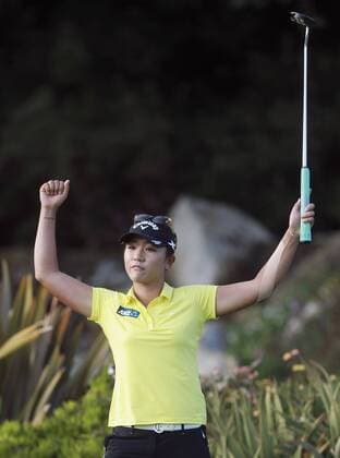 March 27, 2016 - Carlsbad, USA - CARLSBAD, March 27, 2016 Lydia Ko celebrates after making a birdie putt at the 18th hole to win the Kia Classic at the Aviara Golf Club in Carlsbad on Sunday. -Mandatory Photo Credit: Photo by Hayne Palmour IV San Diego Union-Tribune, LLC San Diego California News - March 27, 2016 - ZUMAs44_