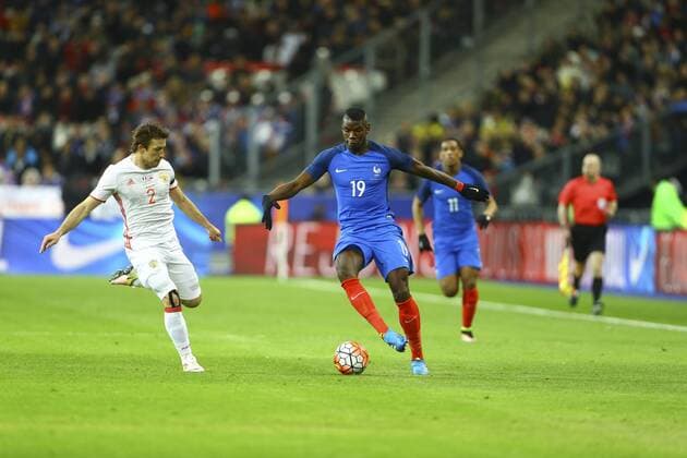 Oleg Kuzmin (Russie) vs Paul Pogba (France) FOOTBALL : FRA vs RUS - Nationalteam - Länderspiel - 29 03 2016 GwendolineLeGoff Panoramic 