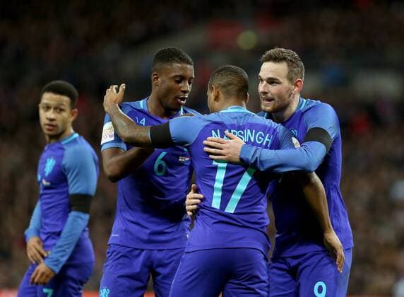 LONDON, March 29, 2016 -- Players of the Netherlands celebrate after scoring during the International Friendly Länderspiel Nationalteam Match between England and the Netherlands at Wembley Stadium in London, Britain, on March 29, 2016. England lost 1-2. ) (SP)BRITAIN-LONDON-SOCCER-FRIENDLY MATCH-ENGLAND VS NETHERLANDS HanxYan 