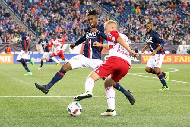 April 1, 2016; Foxborough, MA, USA; New England Revolution defender London Woodberry (28) and New York Red Bulls forward Mike Grella (13) in action during first half of an MLS Fussball Herren USA game between the New England Revolution and New York Red Bulls at Gillette Stadium. New England won 1-0. MLS 2016: Red Bulls vs Revolution APR 01 - ZUMAc04_