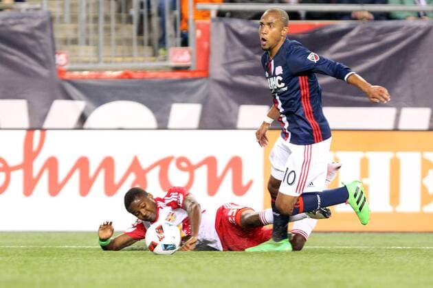 April 1, 2016; Foxborough, MA, USA; New England Revolution forward Teal Bunbury (10) and New York Red Bulls defender Chris Duvall (25) in action during an MLS Fussball Herren USA game between the New England Revolution and New York Red Bulls at Gillette Stadium. New England won 1-0. MLS 2016: Red Bulls vs Revolution APR 01 - ZUMAc04_