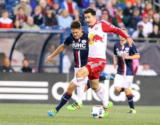 April 1, 2016; Foxborough, MA, USA; New England Revolution defender Chris Tierney (8) and New York Red Bulls midfielder Sacha Kljestan (16) in action during the first half of an MLS Fussball Herren USA game between the New England Revolution and New York Red Bulls at Gillette Stadium. New England won 1-0. MLS 2016: Red Bulls vs Revolution APR 01 - ZUMAc04_