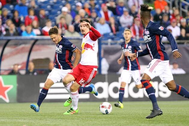 April 1, 2016; Foxborough, MA, USA; New England Revolution defender Chris Tierney (8) and New York Red Bulls midfielder Sacha Kljestan (16) in action during the first half of an MLS Fussball Herren USA game between the New England Revolution and New York Red Bulls at Gillette Stadium. MLS 2016: Red Bulls vs Revolution APR 01 - ZUMAc04_