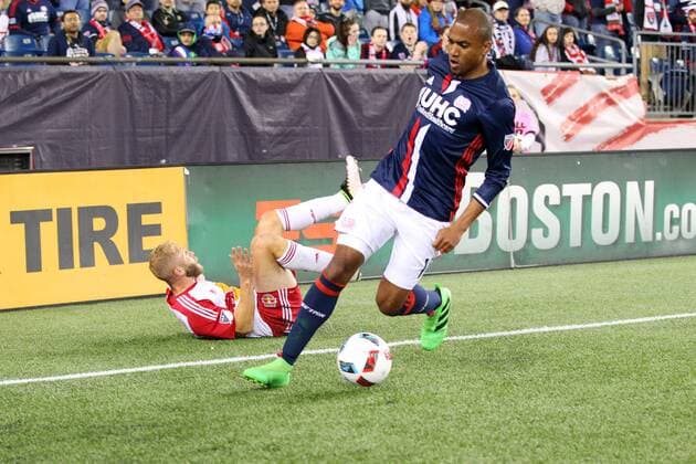 April 1, 2016; Foxborough, MA, USA; New England Revolution forward Teal Bunbury (10) and New York Red Bulls forward Mike Grella (13) battle for the ball during the first half of an MLS Fussball Herren USA game between the New England Revolution and New York Red Bulls at Gillette Stadium. MLS 2016: Red Bulls vs Revolution APR 01 - ZUMAc04_