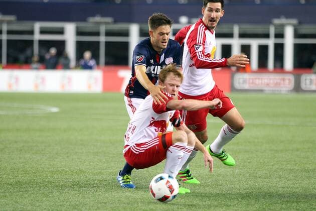 April 1, 2016; Foxborough, MA, USA; New England Revolution defender Chris Tierney (8) and New York Red Bulls midfielder Dax McCarty (11) battle for the ball during the first half of an MLS Fussball Herren USA game between the New England Revolution and New York Red Bulls at Gillette Stadium. New England won 1-0. MLS 2016: Red Bulls vs Revolution APR 01 - ZUMAc04_