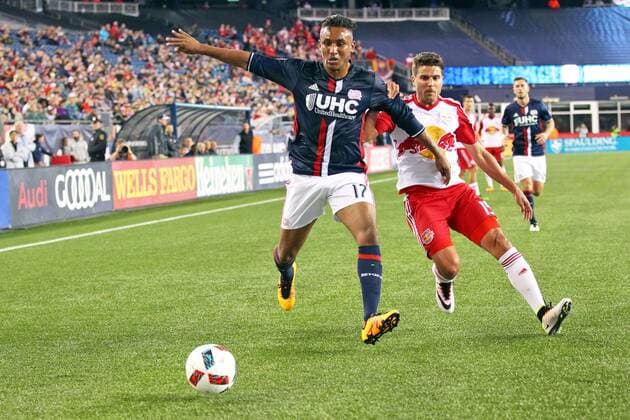 April 1, 2016; Foxborough, MA, USA;New England Revolution forward Juan Agudelo (17) and New York Red Bulls midfielder Salvatore Zizzo (15) battle for the ball during the first half of an MLS Fussball Herren USA game between the New England Revolution and New York Red Bulls at Gillette Stadium. MLS 2016: Red Bulls vs Revolution APR 01 - ZUMAc04_