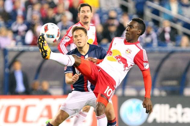 April 1, 2016; Foxborough, MA, USA; New York Red Bulls midfielder Lloyd Sam (10) kicks the ball defended by New England Revolution defender Chris Tierney (8) during the first half of an MLS Fussball Herren USA game between the New England Revolution and New York Red Bulls at Gillette Stadium. New England won 1-0. MLS 2016: Red Bulls vs Revolution APR 01 - ZUMAc04_