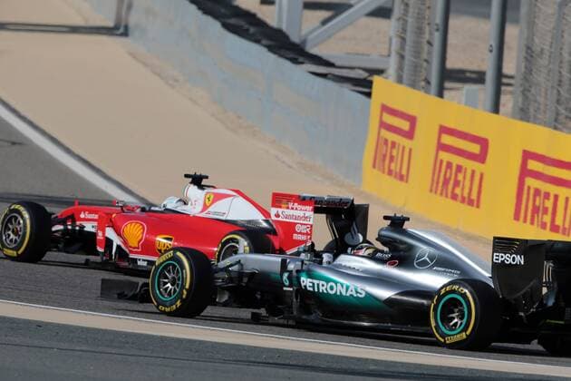 Formel 1, GP Bahrain Bahrain Grand Prix, Sakhir 31 March - 03 April 2016 02.04.2016 - Free Practice 3, Sebastian Vettel (GER) Scuderia Ferrari SF16-H and Lewis Hamilton (GBR) Mercedes AMG F1 W07 Hybrid 