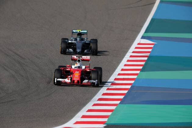 Formel 1, GP Bahrain Bahrain Grand Prix, Sakhir 31 March - 03 April 2016 02.04.2016 - Free Practice 3, Sebastian Vettel (GER) Scuderia Ferrari SF16-H leads Nico Rosberg (GER) Mercedes AMG F1 W07 Hybrid 