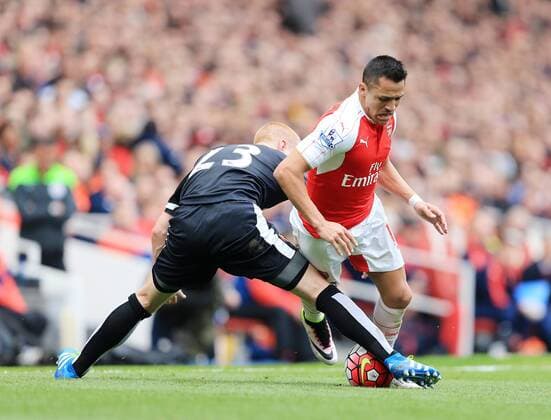 Arsenal s Alexis Sanchez tussles with Watford s Ben Watson during the Premier League match at Emirates Stadium. Photo credit should read: David Klein Sportimage EDITORIAL USE ONLY. No use with unauthorised audio, video, data, fixture lists, club league logos or live services. Online in-match use limited to 120 images, no video emulation. No use in betting, games or single club league player publications.