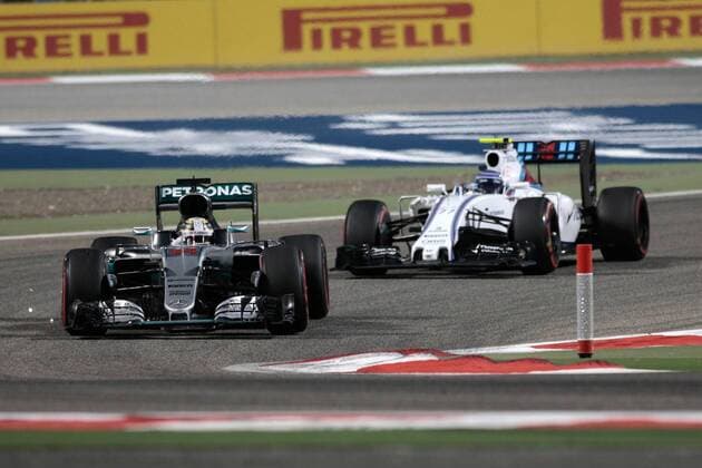 FORMULA 1 - Bahrain GP SAKHIR,BAHRAIN,03.APR.16 - MOTORSPORTS, FORMULA 1 - FIA World Championship WM Weltmeisterschaft Grand Prix of Bahrain, Bahrain International Circuit, award ceremony. Image shows Lewis Hamilton (GBR Mercedes GP) and 77. GEPAxpictures xFritzxMueller