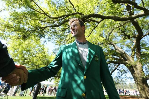 April 3, 2016 - Augusta, GA, USA - Adam Scott, the 2013 Masters champion, sports his green jacket and shakes hands with fans under the giant oak tree by the clubhouse ahead of the Masters at Augusta National Golf Club, on Sunday, April 3, 2016, in Augusta, Ga. Practice rounds ahead of Masters at Augusta - ZUMAm67_