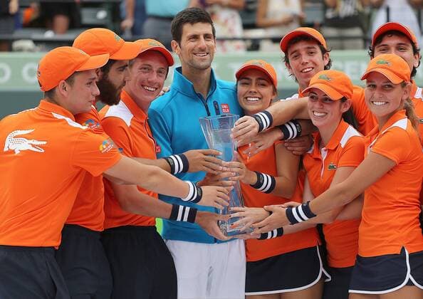 April 3, 2016 - Key Biscayne, FL, USA - Serbia s Novak Djokovic takes a photo with ball crew after defeating Japan s Kei Nishikori 6-3, 6-3, to win the Miami Open championship on Sunday, April 3, 2016, at Cradon Park Tennis Center in Key Biscayne, Fla. World No. 1 Novak Djokovic defeats Kei Nishikori for Miami Open title - ZUMAm67_