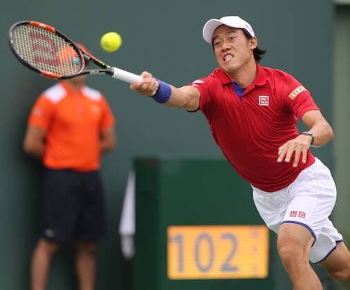 April 3, 2016 - Key Biscayne, FL, USA - Japan s Kei Nishikori returns a shot against Serbia s Novak Djokovic in the finals of the Miami Open on Sunday, April 3, 2016, at Cradon Park Tennis Center in Key Biscayne, Fla. Djokovic won, 6-3, 6-3. World No. 1 Novak Djokovic defeats Kei Nishikori for Miami Open title - ZUMAm67_