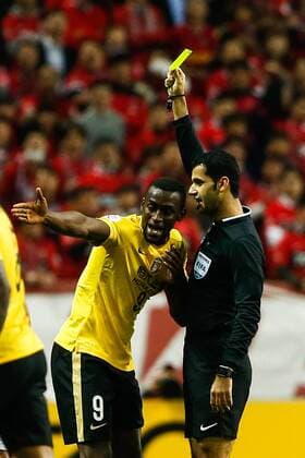 SAITAMA, JAPAN - APRIL 05: (CHINA OUT) Jackson Martinez 9 of Guangzhou Evergrande receives a yellow card from the referee during the AFC Champions League Group H match between Urawa Red Diamonds and Guangzhou Evergrande at the Saitama Stadium on April 5, 2016 in Saitama, Japan.  CFP482263432 