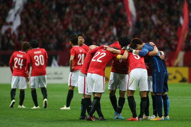 SAITAMA, JAPAN - APRIL 05: (CHINA OUT) Urawa Red Diamonds players celebrate victory after the AFC Champions League Group H match between Urawa Red Diamonds and Guangzhou Evergrande at the Saitama Stadium on April 5, 2016 in Saitama, Japan.  CFP482263882 