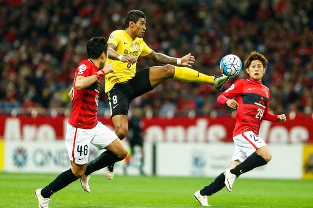 SAITAMA, JAPAN - APRIL 05: (CHINA OUT) Paulinho 8 of Guangzhou Evergrande and Ryota Moriwaki 46 of Urawa Red Diamonds compete for the ball during the AFC Champions League Group H match between Urawa Red Diamonds and Guangzhou Evergrande at the Saitama Stadium on April 5, 2016 in Saitama, Japan.  CFP482263887 