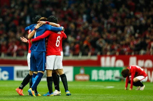 SAITAMA, JAPAN - APRIL 05: (CHINA OUT) Urawa Red Diamonds players celebrate victory after the AFC Champions League Group H match between Urawa Red Diamonds and Guangzhou Evergrande at the Saitama Stadium on April 5, 2016 in Saitama, Japan.  CFP482263890 