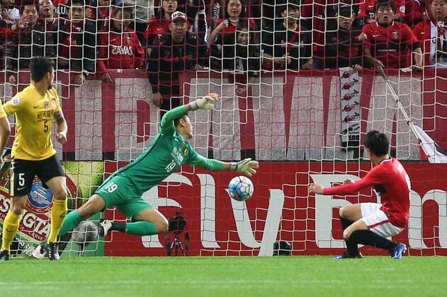 SAITAMA, JAPAN - APRIL 05: (CHINA OUT) Yuki Muto 9 of Urawa Red Diamonds scores a goal during the AFC Champions League Group H match between Urawa Red Diamonds and Guangzhou Evergrande at the Saitama Stadium on April 5, 2016 in Saitama, Japan.  CFP482263899 