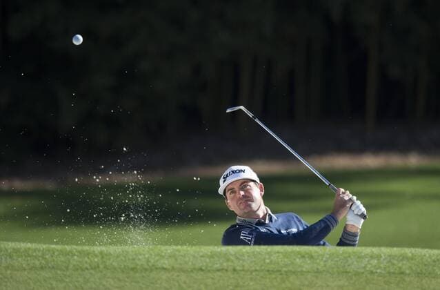 Keegan Bradley hits out of a bunker on the 4th hole during a practice round before the 2016 Masters Tournament at Augusta National in Augusta, Georgia on April 5, 2016.  AUG20160405315 KEVINxDIETSCH
