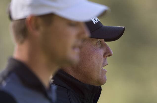 Phil Mickelson (R) walks with Bryson DeChambeau on the 4th fairway during a practice round before the 2016 Masters Tournament at Augusta National in Augusta, Georgia on April 5, 2016.  AUG20160405316 KEVINxDIETSCH