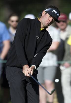 Bubba Watson chips onto the 3rd green during a practice round before the 2016 Masters Tournament at Augusta National in Augusta, Georgia on April 5, 2016.  AUG20160405324 KEVINxDIETSCH