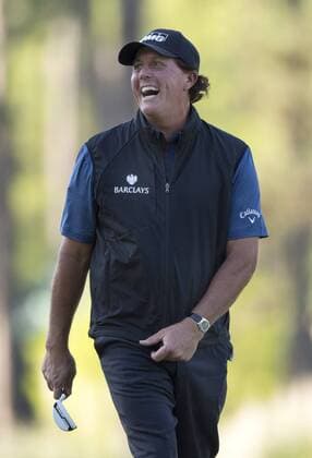 Phil Mickelson laughs on the 3rd green during a practice round before the 2016 Masters Tournament at Augusta National in Augusta, Georgia on April 5, 2016.  AUG20160405307 KEVINxDIETSCH