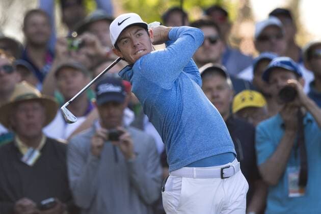 Rory McIlroy watches his tee shot on the 4th tee during a practice round before the 2016 Masters Tournament at Augusta National in Augusta, Georgia on April 5, 2016.  AUG20160405317 KEVINxDIETSCH