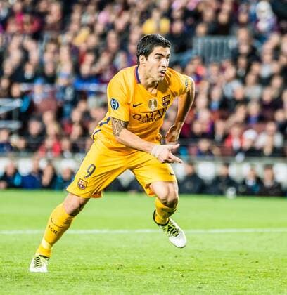 April 5, 2016 - Barcelona, Catalonia, Spain - FC Barcelona Barca forward SUAREZ celebrates his second goal during the first leg of the Champions League quarter-final against Atletico Madrid at the Camp Nou stadium in Barcelona FC Barcelona 2:1 Atletico Madrid - Champions League Quarter Final - ZUMAo105