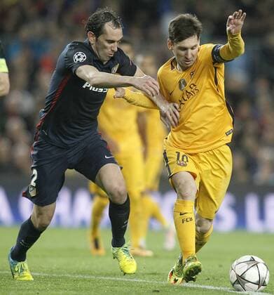 FC Barcelona Barca s Leo Messi (r) and Atletico de Madrid s Diego Godin during Champions League 2015 2016 match. April 5,2016.  (2016040570)