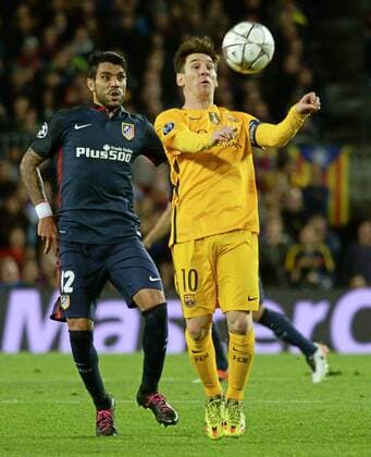 First leg of 1 4 Champions League 2015 2016 match between FC Barcelona Barca and Atletico Madrid. In this picture, Augusto and Lionel Messi. xADRIANxQUIROGAx 