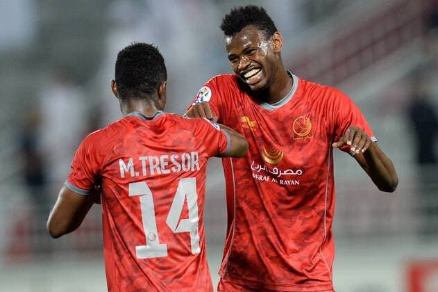 (160406) -- DOHA, April 6, 2016 -- Mohammed Muntari (R) of Qatar s Lekhwiya celebrates after scoring a goal agates Saudi Arabia s Al-Nassr during the AFC Asian Champions League group B football match between Qatar s Lekhwiya and Saudi Arabia s Al-Nassr at Lekhwiya stadium, in Doha, Qatar, on April 05, 2016. Qatar s Lekhwiya won 4-0. ) (SP)QATAR-DOHA-FOOTBALL-AFC CHAMPIONS LEAGUE Nikku 