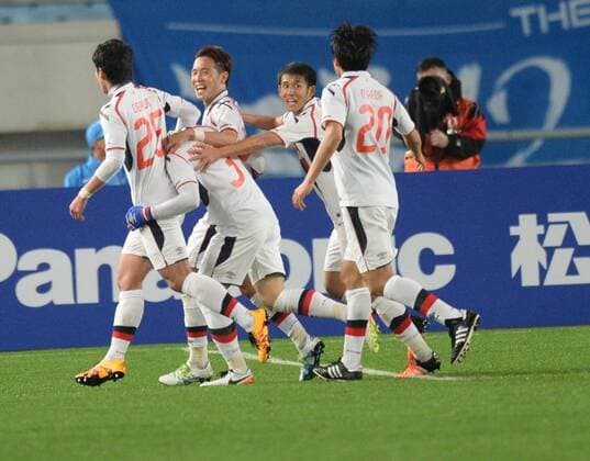 Masato Morishige ( 3), second left, of Japans FC Tokyo celebrates with teammates after scoring a goal against China s Jiangsu Suning in their Group E match during the AFC Champions League 2016 in Nanjing city, east China s Jiangsu province, 6 April 2016. Jiangsu Suning vs FC Tokyo at AFC Champions League  20160406_65168