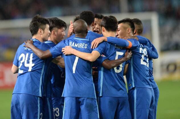 Players of China s Jiangsu Suning celebrate after scoring a goal by a penalty shot against Japans FC Tokyo in their Group E match during the AFC Champions League 2016 in Nanjing city, east China s Jiangsu province, 6 April 2016. Jiangsu Suning vs FC Tokyo at AFC Champions League  20160406_65160