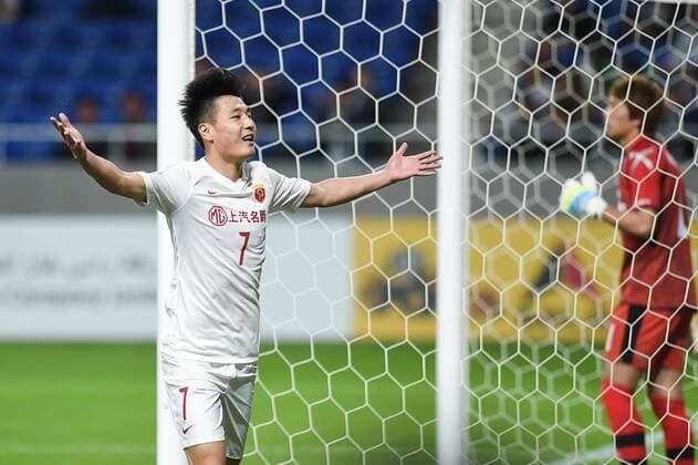 OSAKA, JAPAN - APRIL 06: (CHINA OUT) Wu Lei 7 of Shanghai SIPG celebrates after scoring his team s first goal during the AFC Champions League Group G match between Gamba Osaka and Shanghai SIPG at the Suita City Football Stadium on April 6, 2016 in Osaka, Japan.  CFP482306055 