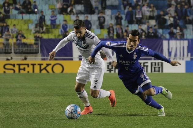 April 6, 2016 - Suwon, Gyeonggi, South Korea - Cho Won Hee of Suwon Samsung Bluewings FC and Kosta Barbarouses of Melbourne Victory action during an ACL Group G Suwon Samsung Bluewings FC vs Melbourne Victory match at World Cup Stadium in Suwon South Korea. Today match 1:1 Same. ACL-Group G Suwon Samsung Bluewings FC v Melbourne Victory-Suwon - ZUMAs168