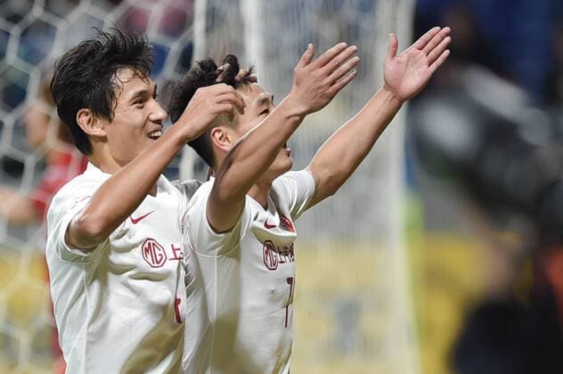 OSAKA, JAPAN - APRIL 06: (CHINA OUT) Wu Lei 7 of Shanghai SIPG celebrates after scoring his team s first goal during the AFC Champions League Group G match between Gamba Osaka and Shanghai SIPG at the Suita City Football Stadium on April 6, 2016 in Osaka, Japan.  CFP482306146 