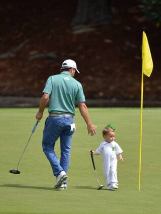 Kevin Kinsler and his daughter Kathleen walk off of the eighth hole during the Par Three Contest at the 2016 Masters Tournament at Augusta National in Augusta, Georgia on April 6, 2016.  AUG20160406340 KEVINxDIETSCH