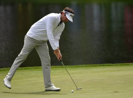Bubba Watson taps his ball in on the ninth hole during the Par Three Contest at the 2016 Masters Tournament at Augusta National in Augusta, Georgia on April 6, 2016.  AUG20160406308 KEVINxDIETSCH