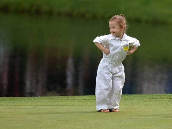 Sammy Schmitz s daughter Aubree, 3, plays on the ninth green during the Par Three Contest at the 2016 Masters Tournament at Augusta National in Augusta, Georgia on April 6, 2016.  AUG20160406365 KEVINxDIETSCH
