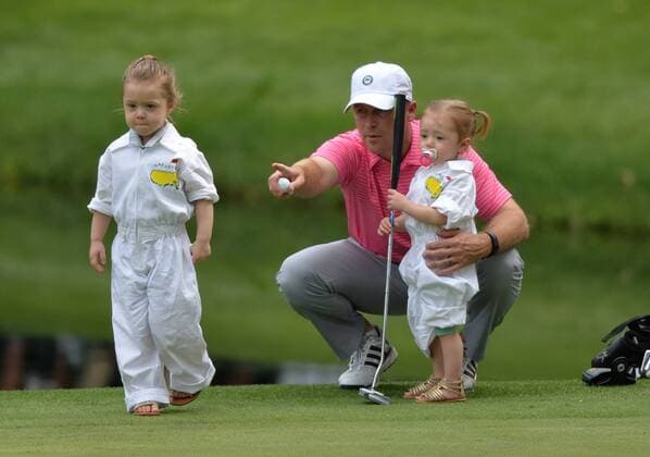 Sammy Schmitz talks to his daughters Aubree, 3, and Allie, 1, during the Par Three Contest at the 2016 Masters Tournament at Augusta National in Augusta, Georgia on April 6, 2016.  AUG20160406367 KEVINxDIETSCH