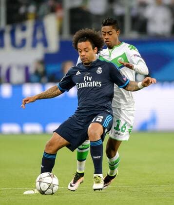 6. April 2016: Wolfsburg, Volkswagen Arena: Fussball UEFA Champions League, Viertelfinale: VfL Wolfsburg - Real Madrid: Wolfsburgs Bruno Henrique (weiss) gegen Madrids Marcelo.