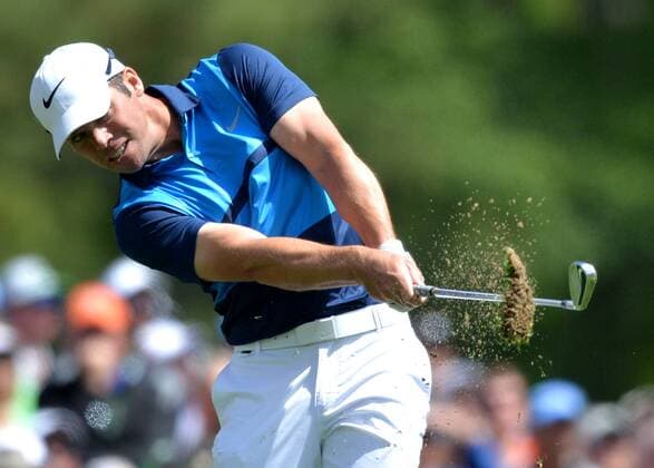 Paul Casey of England hits his tee shot on the 12th hole in the first round of the 2016 Masters Tournament at Augusta National in Augusta, Georgia on April 7, 2016.  MAS20160407140 KEVINxDIETSCH