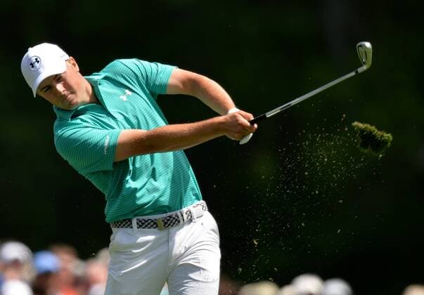 Jordan Spieth hits his tee shot on the 12th hole in the first round of the 2016 Masters Tournament at Augusta National in Augusta, Georgia on April 7, 2016.  MAS20160407143 KEVINxDIETSCH